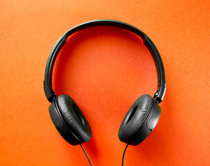 Headphones on a orange background