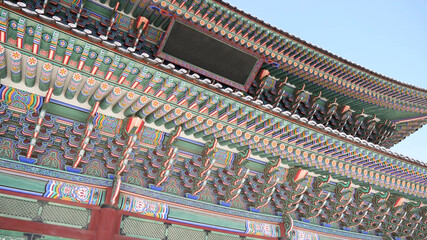 close up view on colorful roof of traditional building in korea, asian Buddhist temple ceiling ornaments architecture roofs. - 452169457