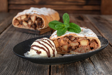 Apple strudel is a delicious puff pastry dessert with apples, nuts and raisins. Strudel is a traditional pastry of Austrian, German, Hungarian and Czech cuisine.