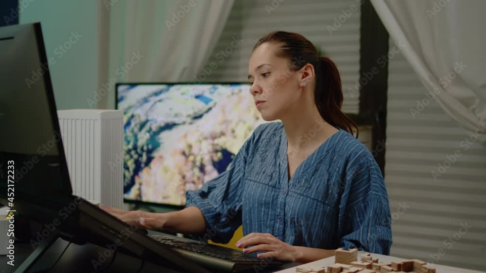 Poster woman architect using touch screen for building model and maquette layout. engineer working with blu