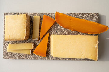 Cheese collection, hard French cheese old cantal and yellow mimolette made from raw cow milk with...