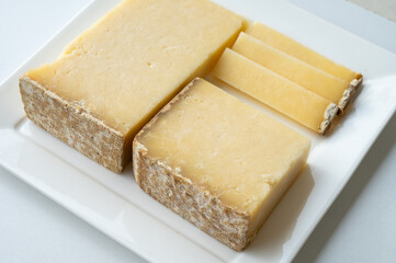 Cheese collection, hard French cheese old cantal made from raw cow milk with rind