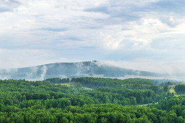 Clouds on the small Mountains after rain