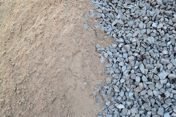A pile of sand and gravel on a construction site.Concept - building materials, repair,...