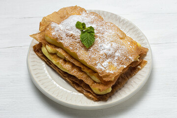 Homemade arabic cake with filo pastry and pastry cream