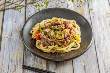 Traditional roast beef teriyaki served with udon