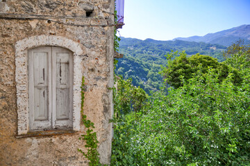 The window of an old house in the landscape of Rivello, a medieval village in the Basilicata region, Italy.