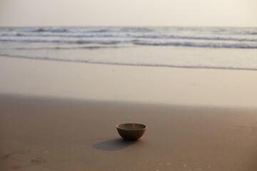 Singing tibetian bowl sea background