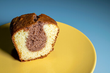 slice of homemade chocolate cake and white dough
