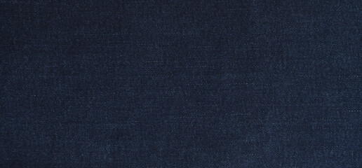 Fototapeta na wymiar Dark Blue jeans texture for background. Denim background