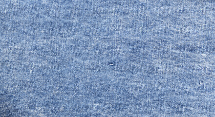 Blue denim texture background in 1990s style.