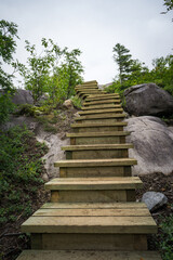 Stairs of the hiking trail leading to the top of Pic de la Tete de Chien in Monts Valin National Park, near Saguenay (Quebec, Canada)