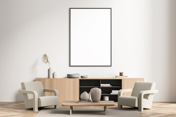 Framed canvas in a light beige waiting room with two armchairs