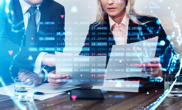 Businessman and businesswoman in formal suit are holding papers