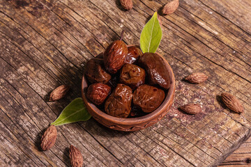 Sun-dried olives in a ceramic bowl