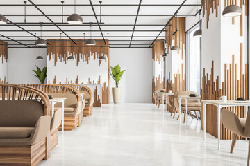View of stylish empty white cafe with beige seats
