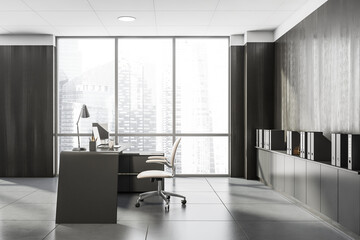 Side view on dark office interior with panoramic window