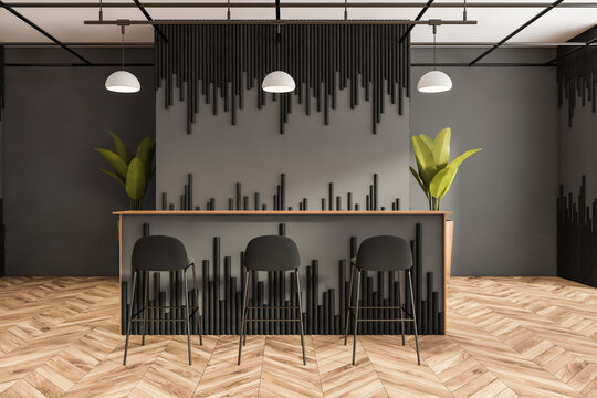 Grey and black cafe bar table with decoration on parquet floor