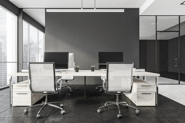 Dark office room interior with panoramic window with Singapore city