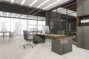 Panoramic glass CEO office area of workspace with grey furniture