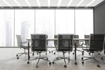 Conference table in the panoramic grey office