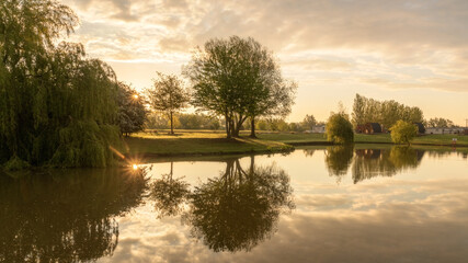 Fototapeta premium sunrise over the lake