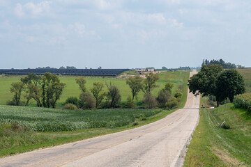 A road leads to a solar farm filling up former pastures in Southern Wisconsin
