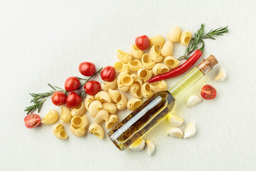 Pasta lumaconi with pepper, garlic, tomato, and rosemary.