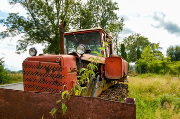 Old Soviet excavator. Historic bulldozer.
