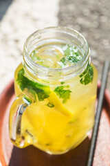 Ice cold fruit and mint tea with ice