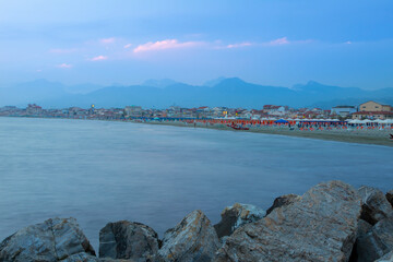 view of the city Viareggio from the pier, you can see the sea beaches and the promenade