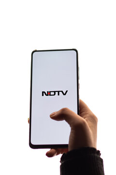Assam, india - November 29, 2020 : NDTV logo on phone screen stock image.