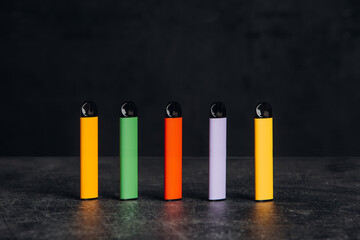 Vaping devices. Set of colorful electronic cigarettes