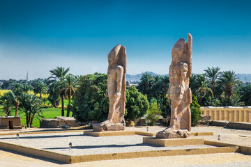 Colossi of Memnon, two massive stone statues of pharaoh Amenhotep III ,  Luxor, Egypt