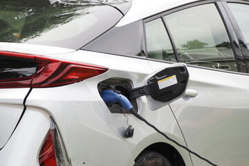 The electric car is getting the battery charged, all cars will be that way in the future.