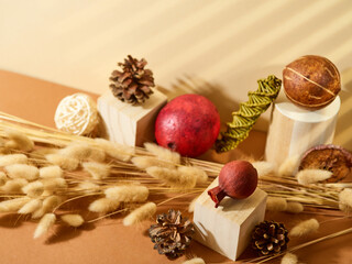 Original handmade composition of cereals, cones, toys, geometric shapes. Great decor for the interior, as well as family holidays, New Years, Christmas, Thanksgiving. Bright hues. Close-up.