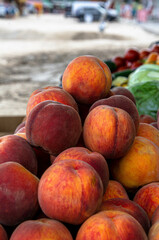 Peaches on the counter of a street vendor.