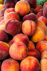 Peaches on the counter of a street vendor.