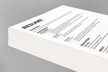 Obraz premium Stack or pile of about 500 abstract generic resumes submitted to apply for a job opening