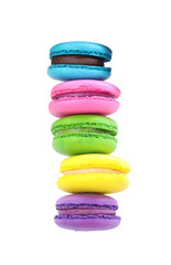 Different delicious colorful macarons on white background, top view