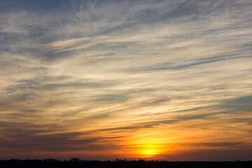 Fototapeta na wymiar A wide shot of a dramatic sunset or sunrise sky