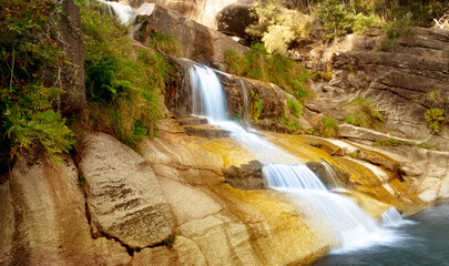 Beautiful waterfall in autumn light