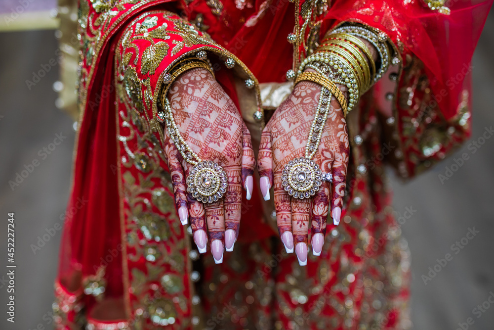 Wall mural Indian bride's wearing her jewellery close up