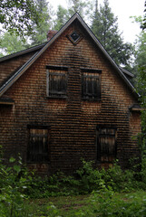 Fototapeta na wymiar old wooden house in forest