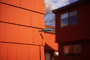 A knife on the red wall