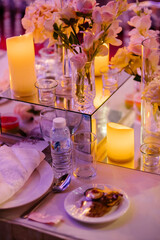 An elaborate table setting at a wedding reception