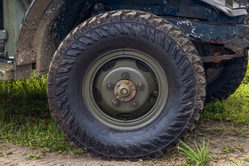 Fototapeta na wymiar オフロード車のタイヤ　Old off-road vehicle mud tires