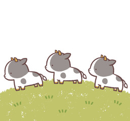 Obraz premium 複数のウシと芝生のフレーム