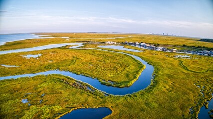 Aerial shot of Marsh land and grass around the Mullica river near Atlantic City in the Pine Barrens, New Jersey, USA