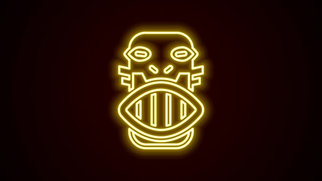 Glowing neon line Mexican mayan or aztec mask icon isolated on black background. 4K Video motion graphic animation